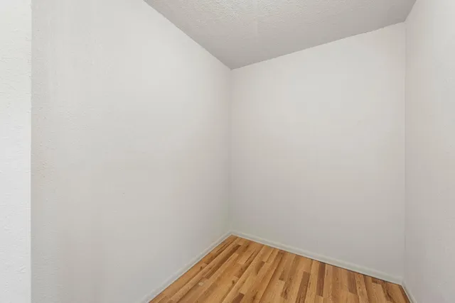 a view of a swimming pool with a lounge chairs