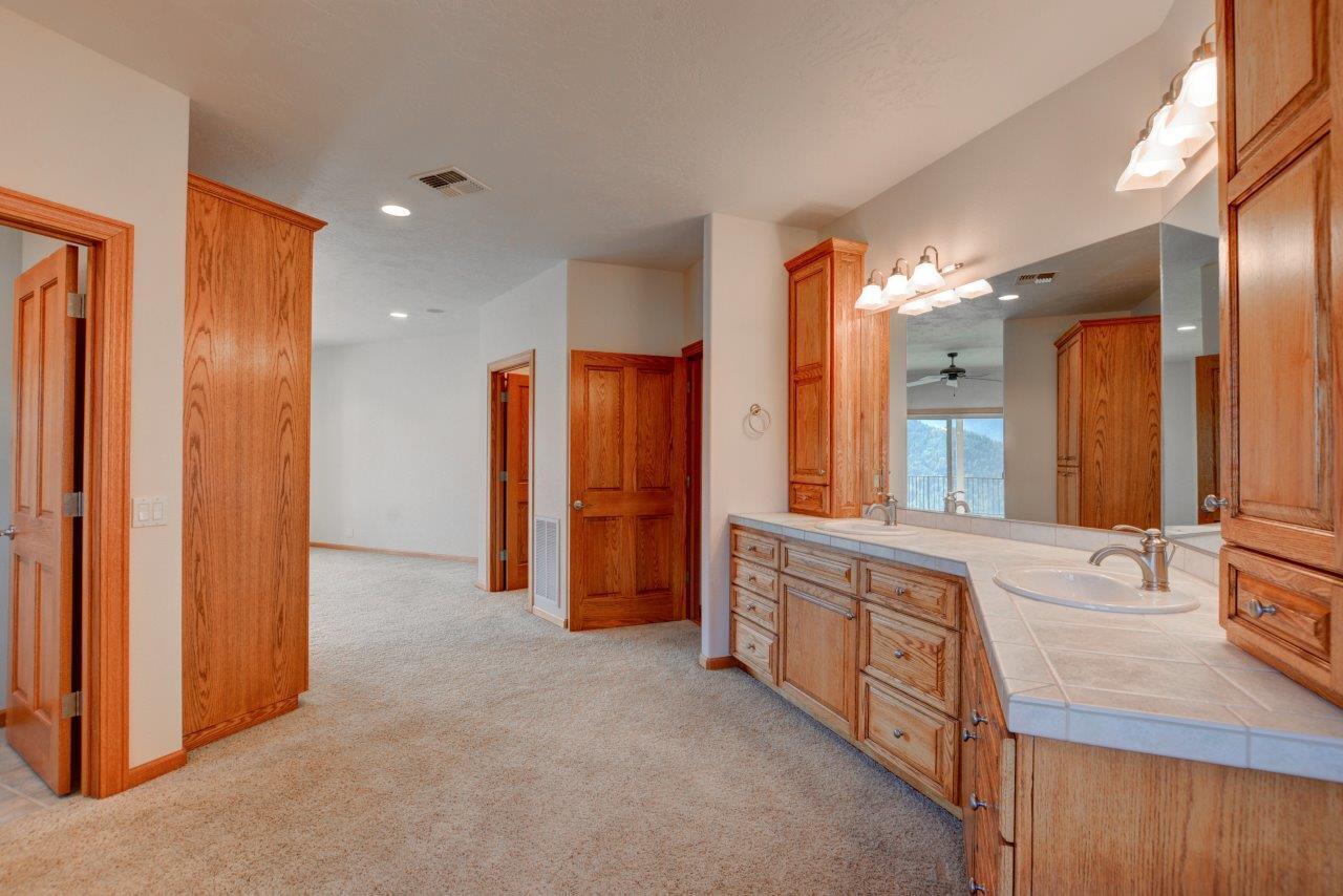3013 Pearce Park Road Grants Pass, OR 97526 - Photo 41 of 96 Dual Sinks and extra cabinet storage.