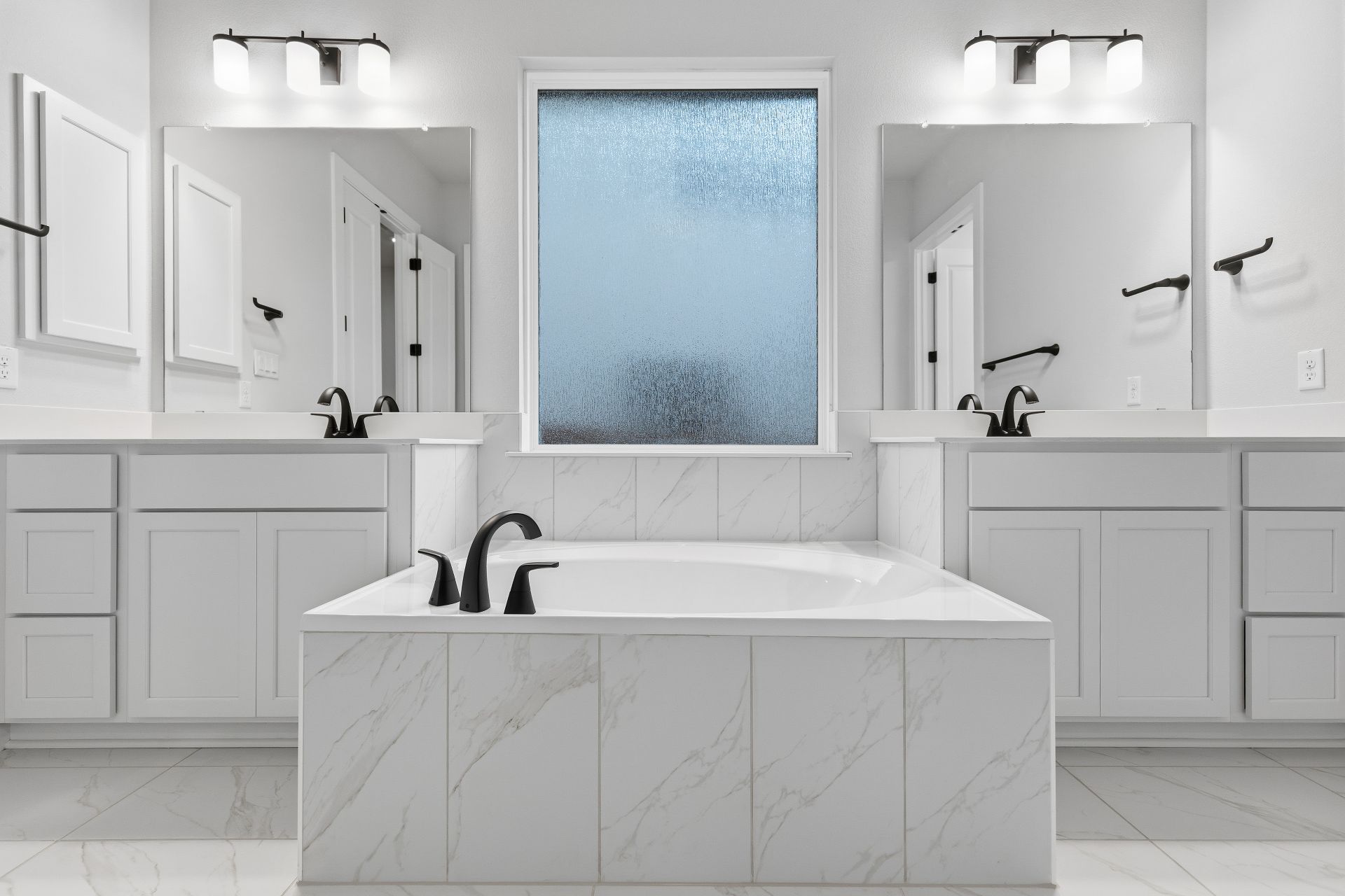 1713 Snowdrop Drive Georgetown, TX 78628 - Photo 21 of 35 a bathroom with a sink and a mirror