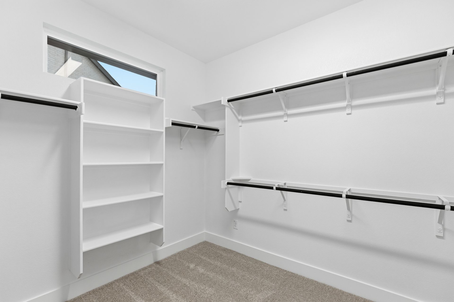 1713 Snowdrop Drive Georgetown, TX 78628 - Photo 22 of 35 a view of walk in closet with empty racks