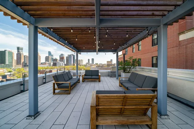 a room with pool table and windows