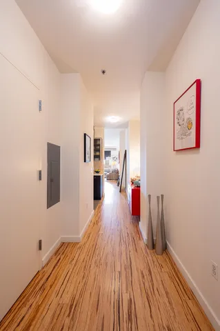a dining room with a table and chairs