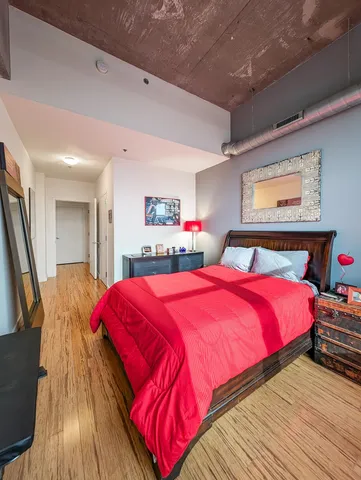 a bathroom with a sink vanity mirror and toilet