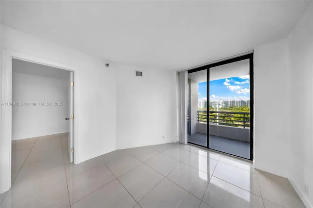 a kitchen with a stove a sink and a refrigerator