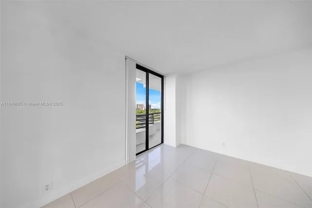 a kitchen with a sink stove top oven and cabinets