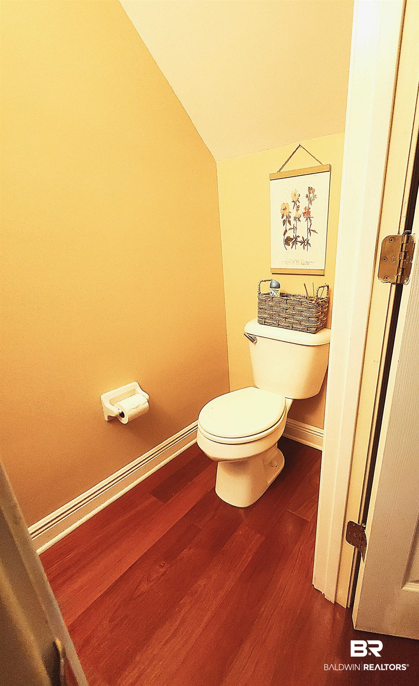 31163 Woodland Way Daphne, AL 36527 - Photo 9 of 44 Bathroom featuring toilet, vaulted ceiling, and hardwood / wood-style floors