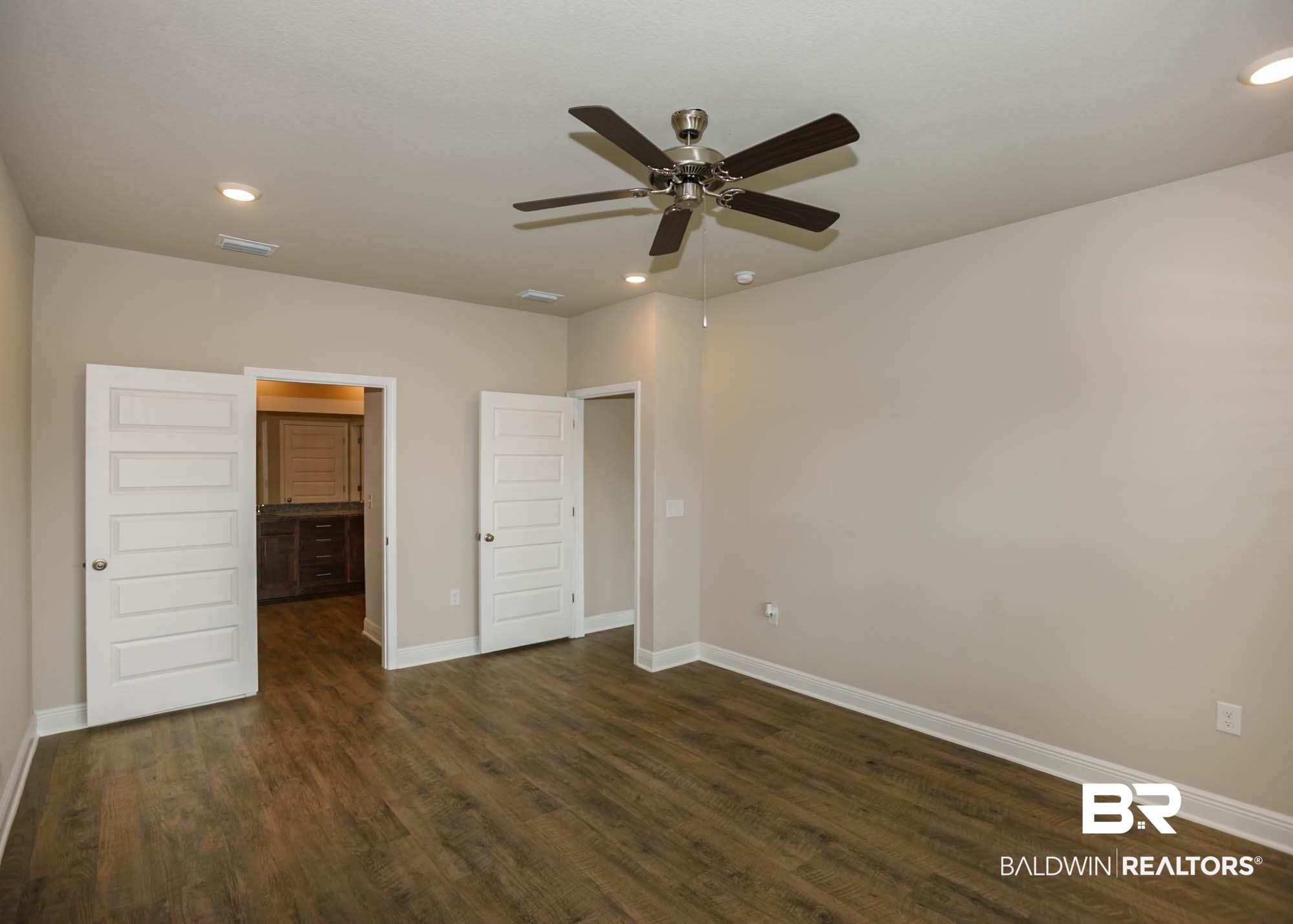 1436 Kairos Loop Foley, AL 36535 - Photo 24 of 52 Unfurnished bedroom with dark wood-style flooring, recessed lighting, and a ceiling fan