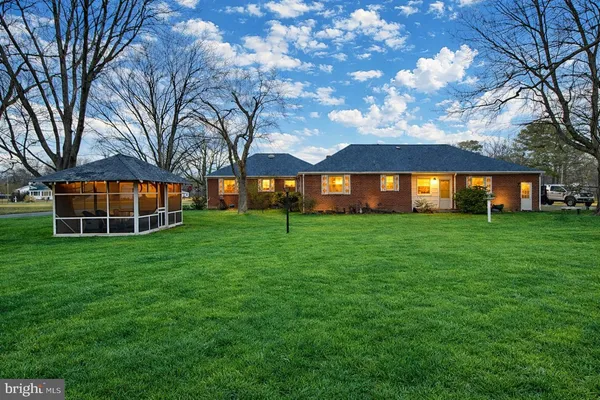 a front view of house with yard