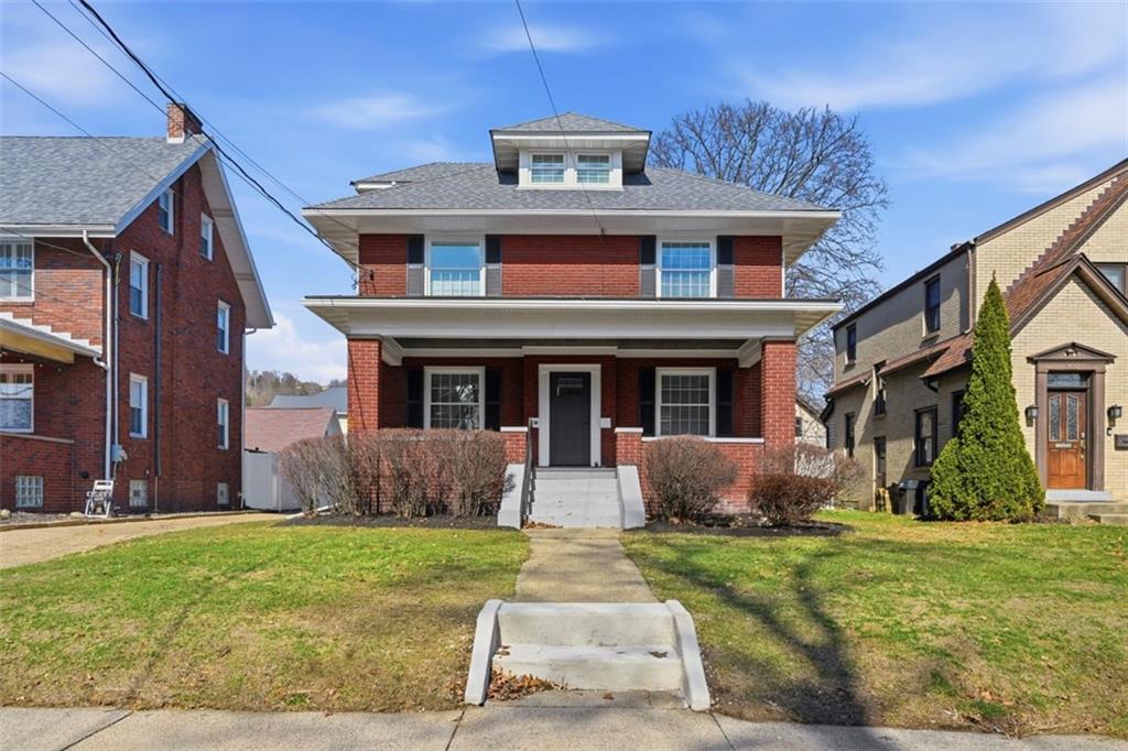 338 4th Street Beaver, PA 15009 - Photo 1 of 50 a front view of a house with garden