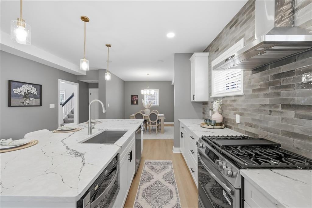 338 4th Street Beaver, PA 15009 - Photo 19 of 50 a kitchen with a stove and a sink