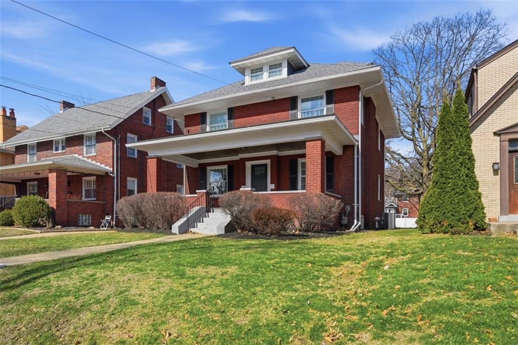 338 4th Street Beaver, PA 15009 - Photo 2 of 50 a front view of a house with a garden