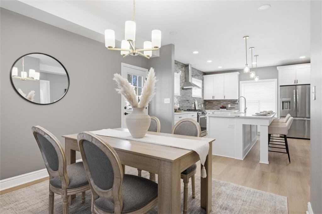 338 4th Street Beaver, PA 15009 - Photo 22 of 50 a view of a dining room with furniture and a chandelier
