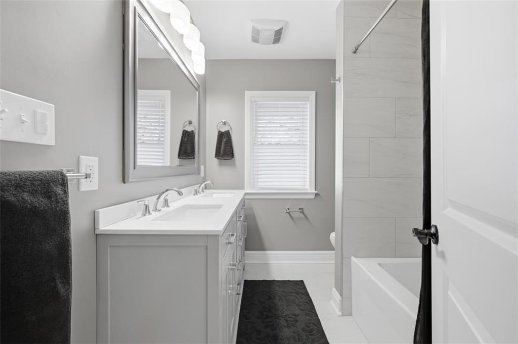 338 4th Street Beaver, PA 15009 - Photo 25 of 50 a bathroom with a sink and a bathtub