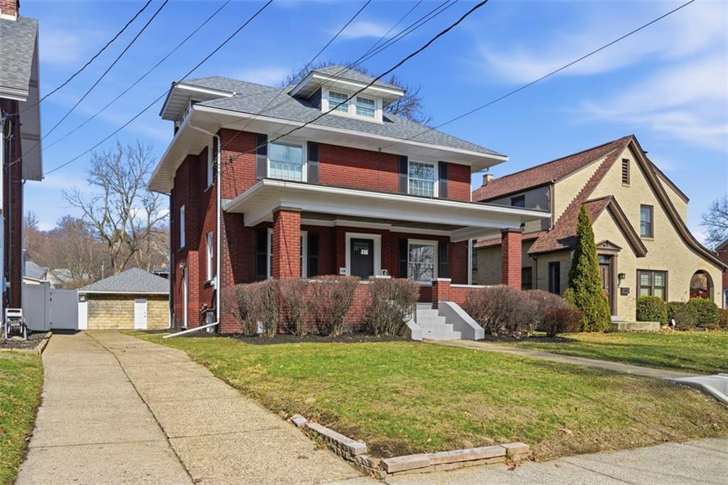 338 4th Street Beaver, PA 15009 - Photo 3 of 50 a front view of a house with garden