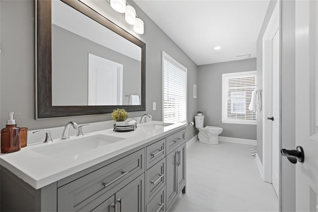 338 4th Street Beaver, PA 15009 - Photo 31 of 50 a bathroom with a sink a toilet and a mirror