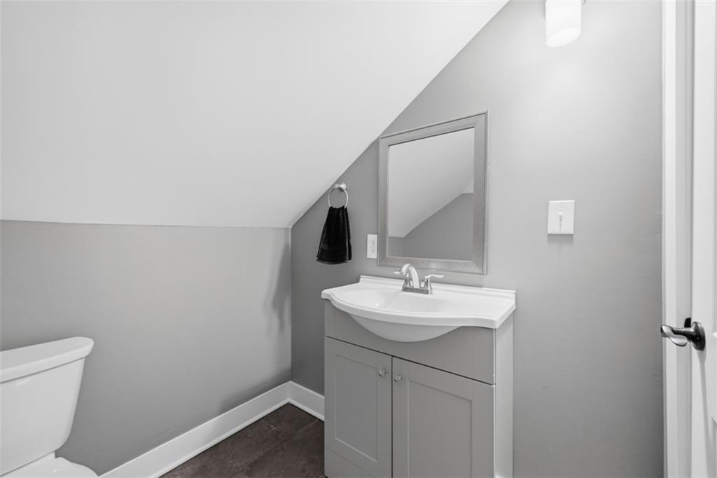 338 4th Street Beaver, PA 15009 - Photo 38 of 50 a bathroom with a sink a toilet and mirror