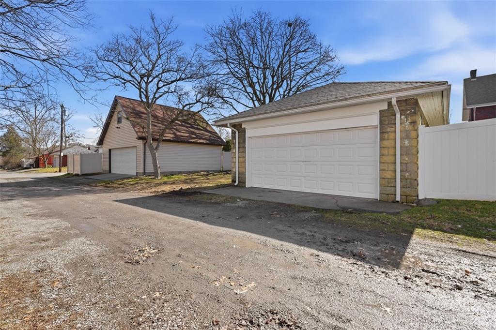 338 4th Street Beaver, PA 15009 - Photo 46 of 50 a front view of a house with a yard and garage