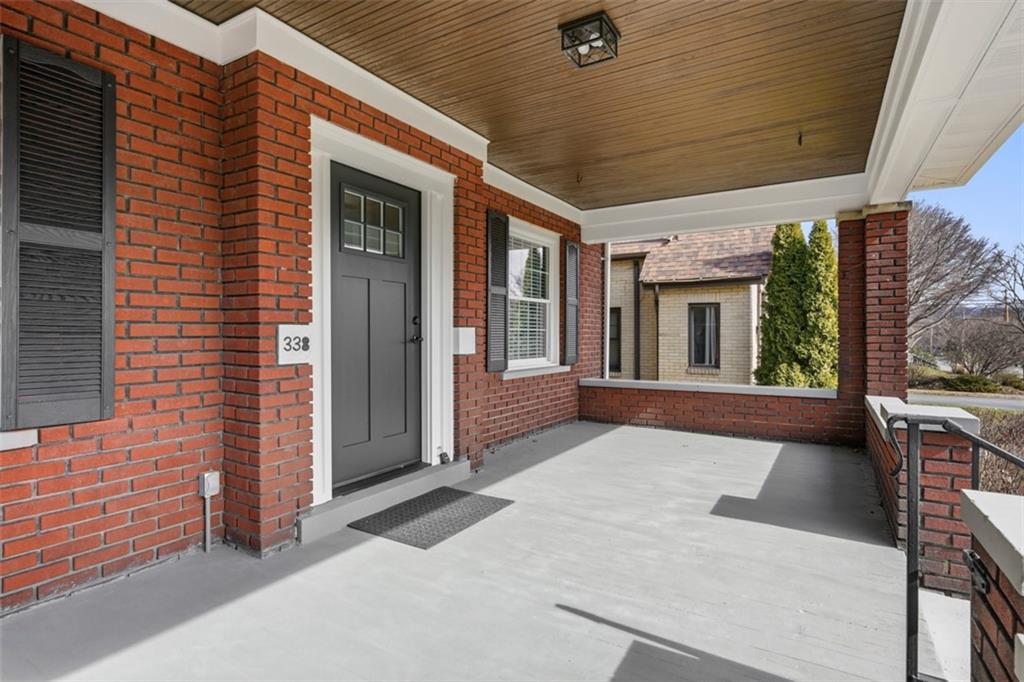 338 4th Street Beaver, PA 15009 - Photo 5 of 50 a view of a porch with a table and chairs