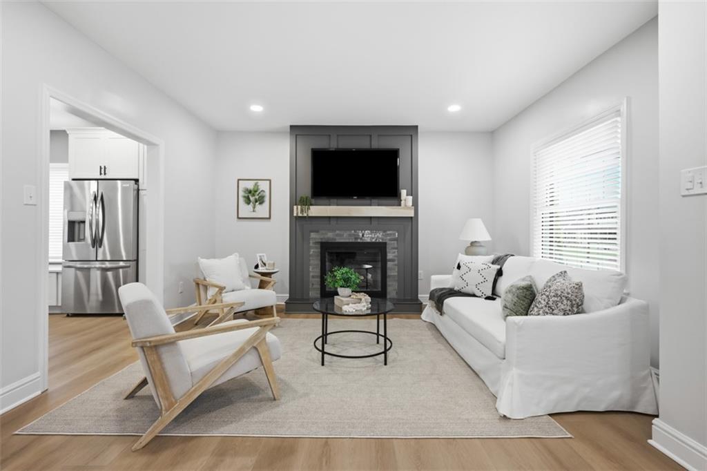 338 4th Street Beaver, PA 15009 - Photo 8 of 50 a living room with furniture and a fireplace