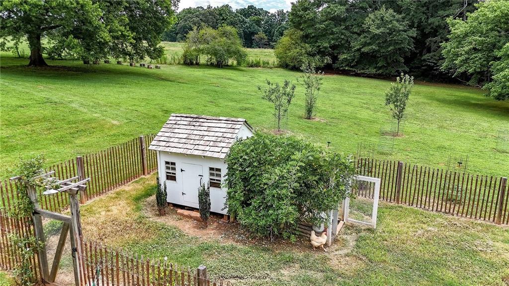 548 Tamarack Trail Canton, GA 30115 - Photo 22 of 83 a view of a backyard with plants