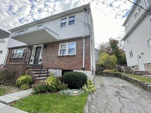 59 Desoto Road, Unit 2 Boston, MA 02132 - Photo 13 of 13 a front view of a house with garden