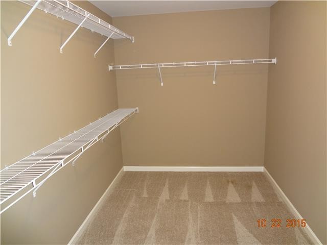2108 Halfmoon Way Murfreesboro, TN 37130 - Photo 2 of 5 a view of a room with racks on the wall