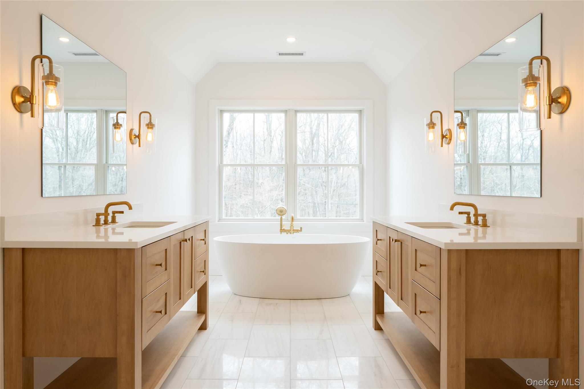 63 Buckout Road West Harrison, NY 10604 - Photo 21 of 34 a bathroom with a tub sink and mirror