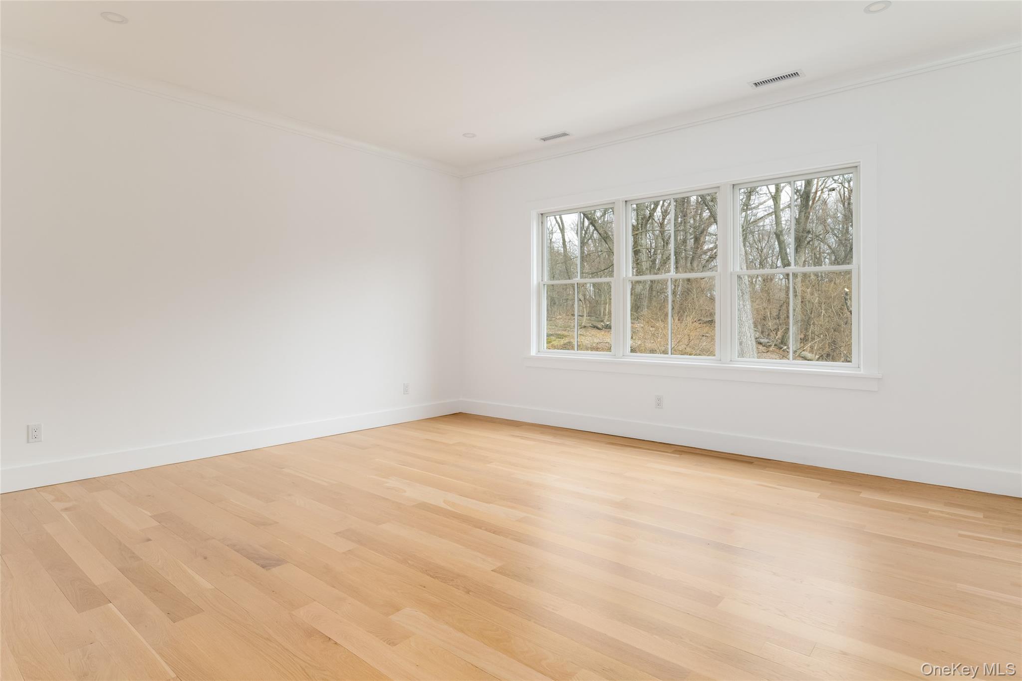 63 Buckout Road West Harrison, NY 10604 - Photo 23 of 34 an empty room with a window