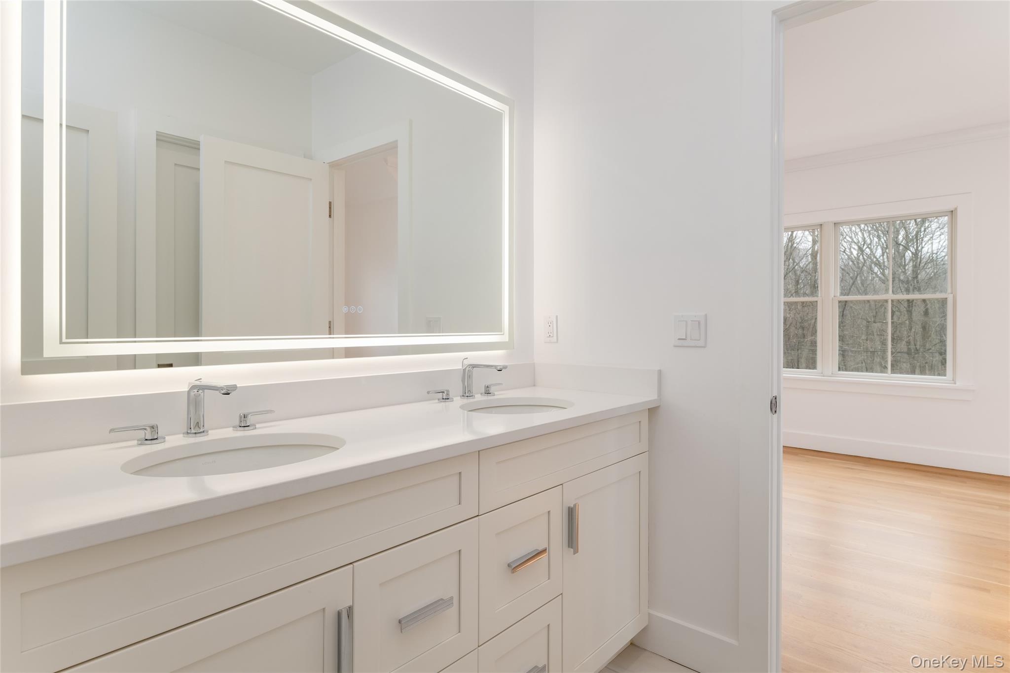 63 Buckout Road West Harrison, NY 10604 - Photo 24 of 34 a bathroom with a sink and a window
