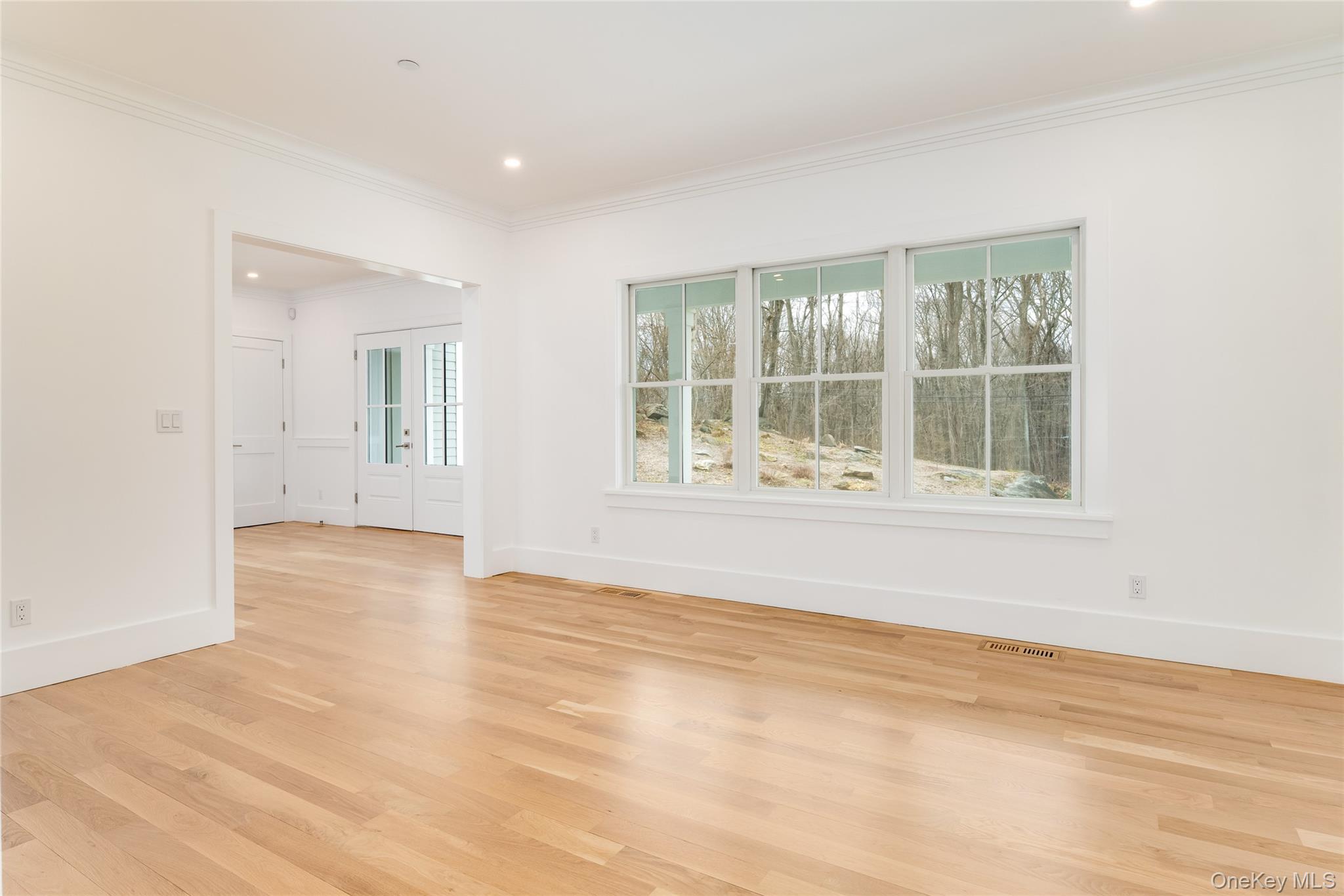63 Buckout Road West Harrison, NY 10604 - Photo 7 of 34 a view of an empty room with a window