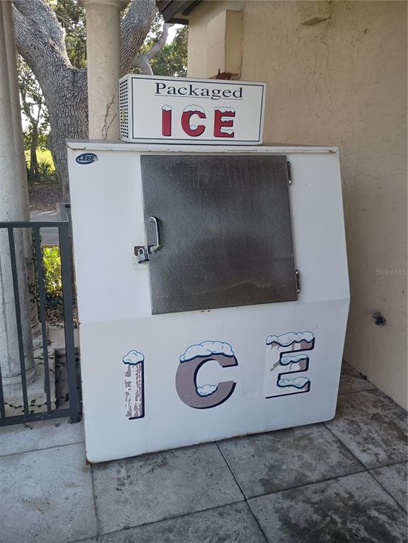 2800 Harbourside Drive, Unit E03 Longboat Key, FL 34228 - Photo 8 of 13 a view of water heater with refrigerator