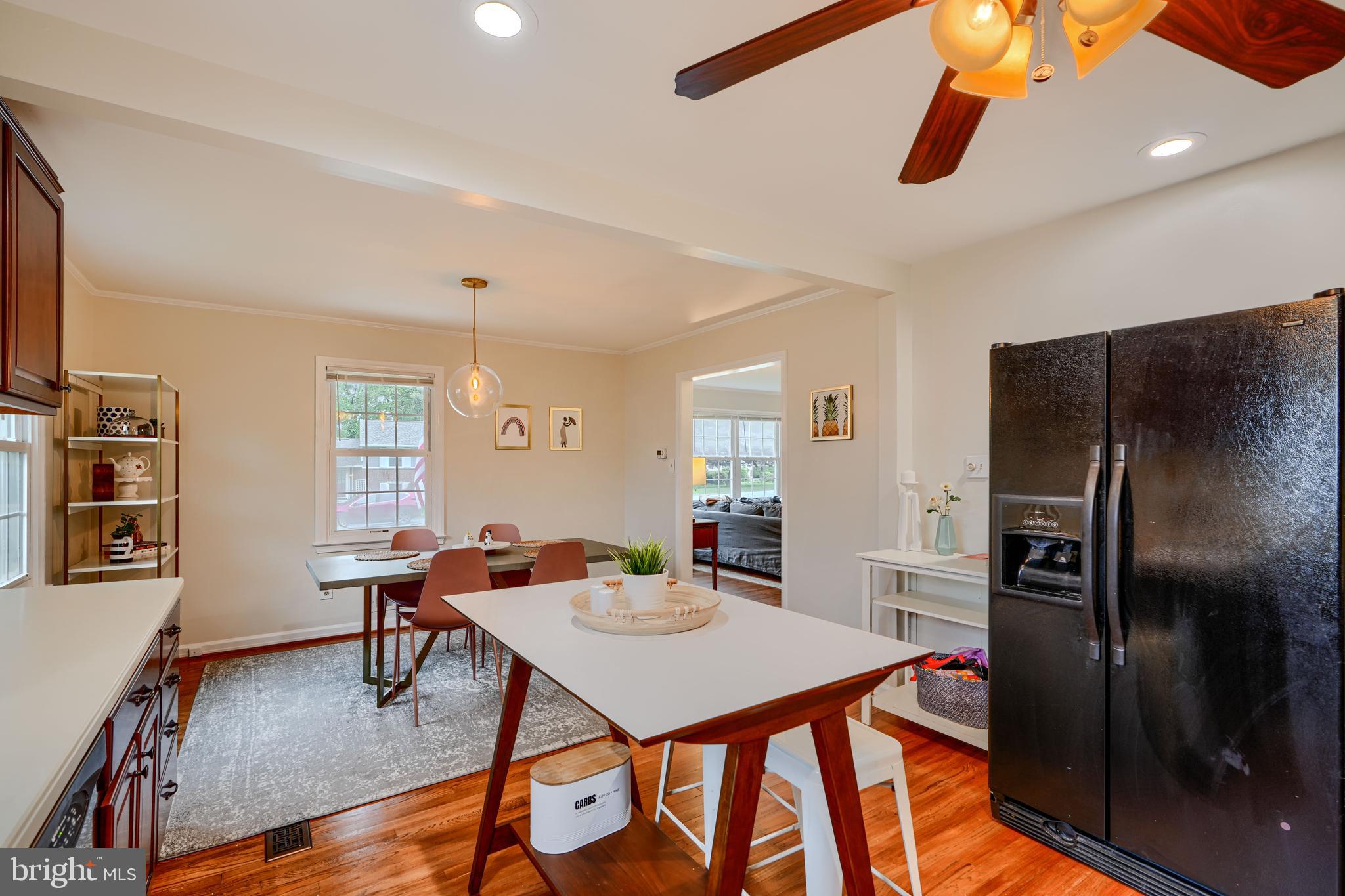 8808 Wolverton Road Baltimore, MD 21234 - Photo 19 of 57 a view of a dining room with furniture