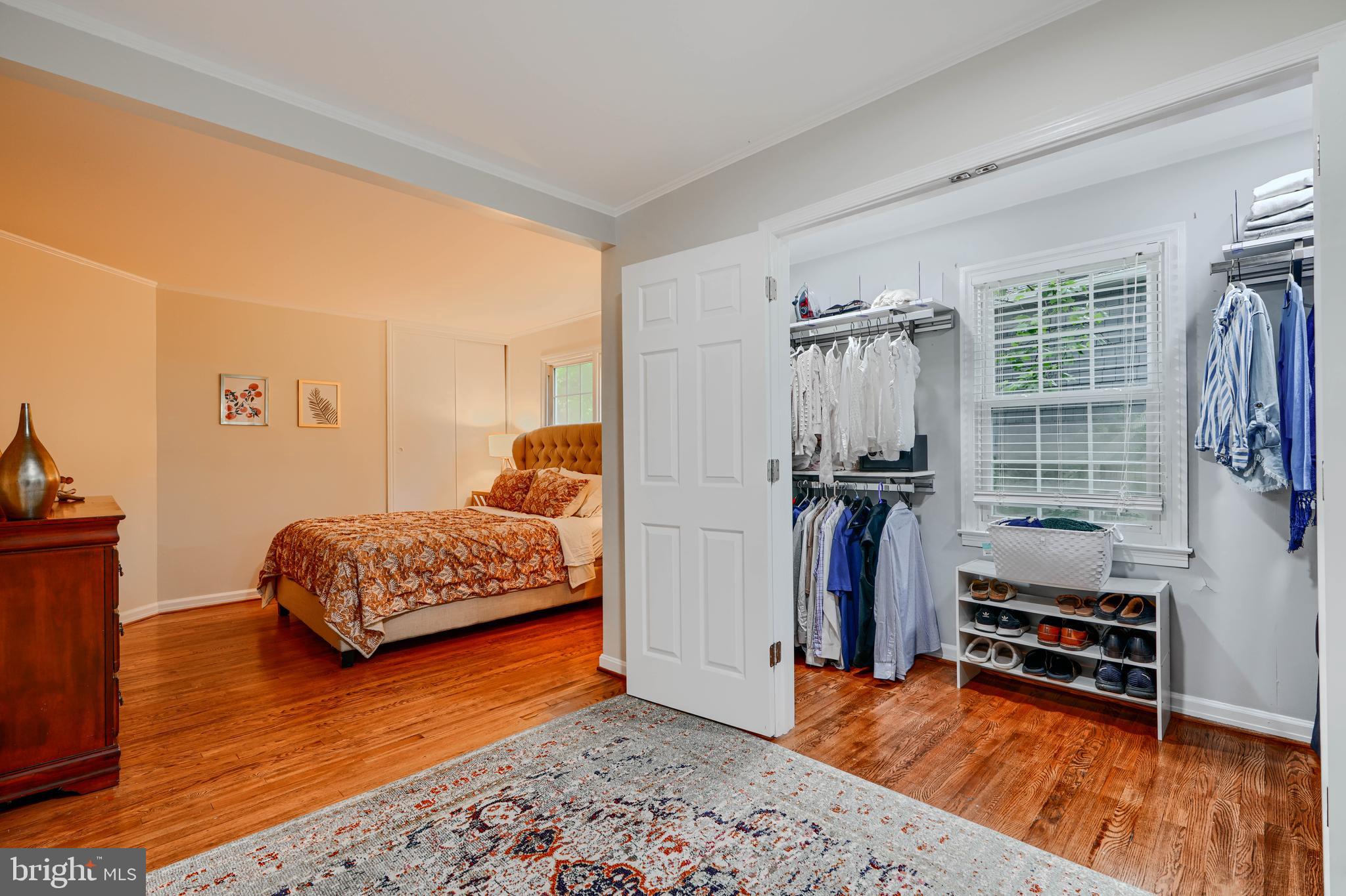 8808 Wolverton Road Baltimore, MD 21234 - Photo 29 of 57 a bedroom with furniture and a wooden floor