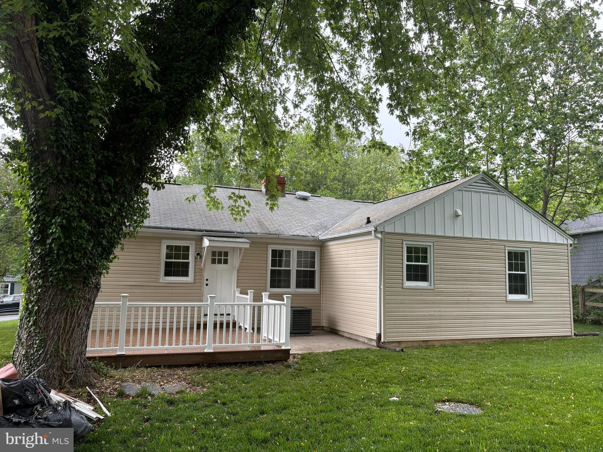 8808 Wolverton Road Baltimore, MD 21234 - Photo 3 of 57 a view of a house with a yard and a porch