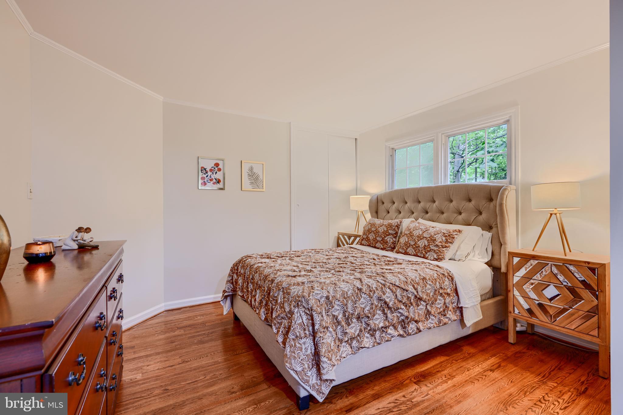 8808 Wolverton Road Baltimore, MD 21234 - Photo 31 of 57 a bedroom with a bed and a window