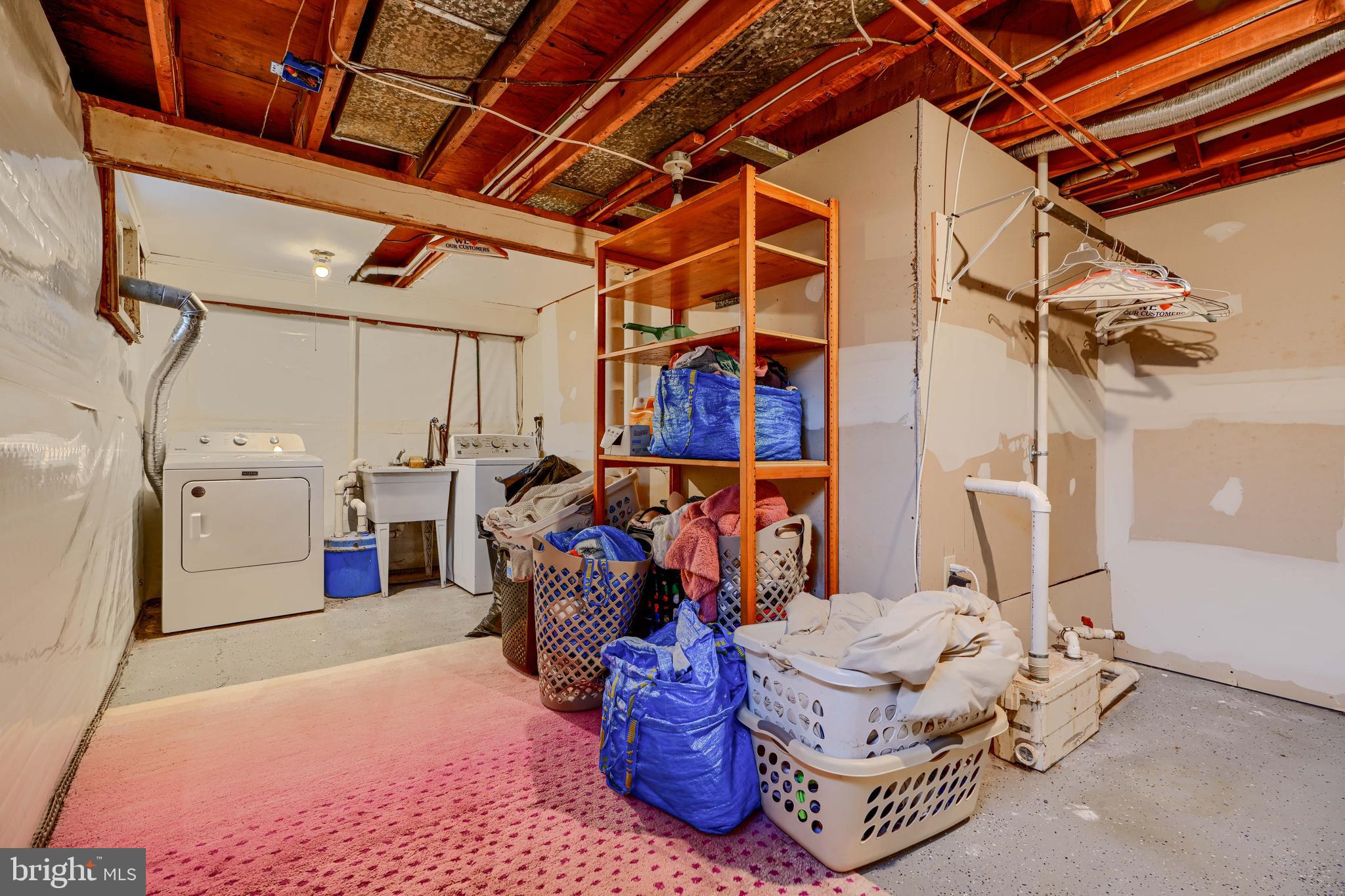 8808 Wolverton Road Baltimore, MD 21234 - Photo 45 of 57 a utility room with dryer and washer