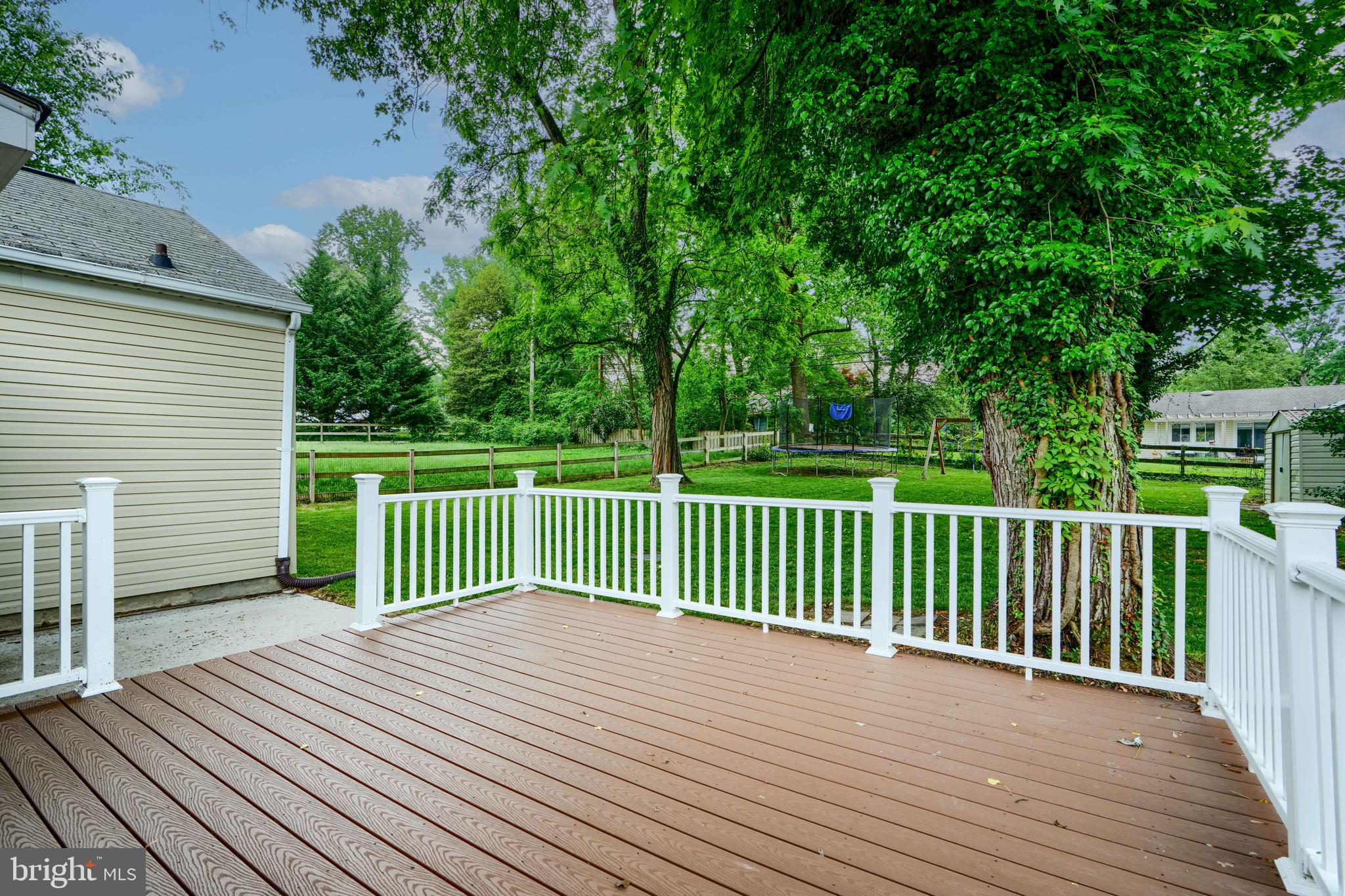 8808 Wolverton Road Baltimore, MD 21234 - Photo 49 of 57 a view of a wooden deck