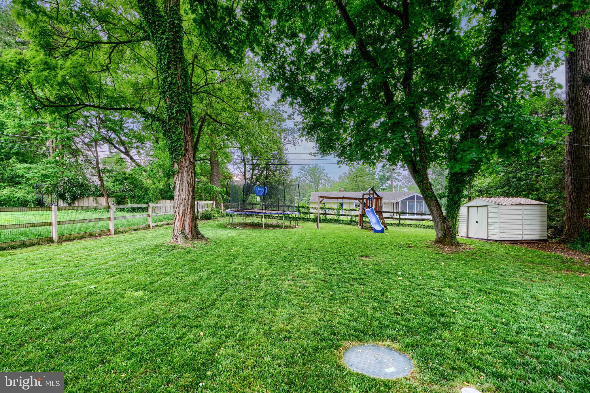8808 Wolverton Road Baltimore, MD 21234 - Photo 51 of 57 a view of a garden with trees