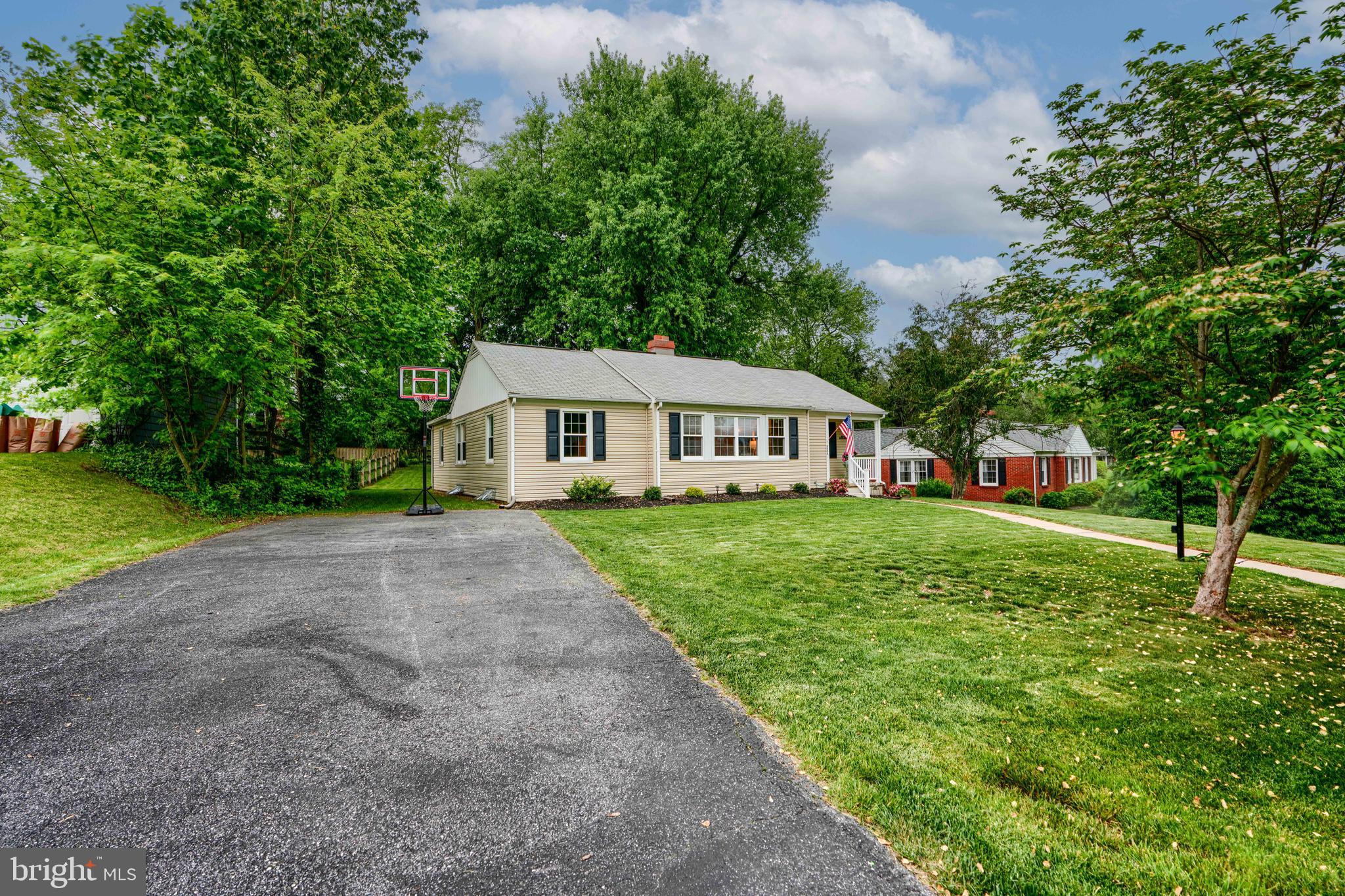 8808 Wolverton Road Baltimore, MD 21234 - Photo 54 of 57 a front view of house with yard and green space