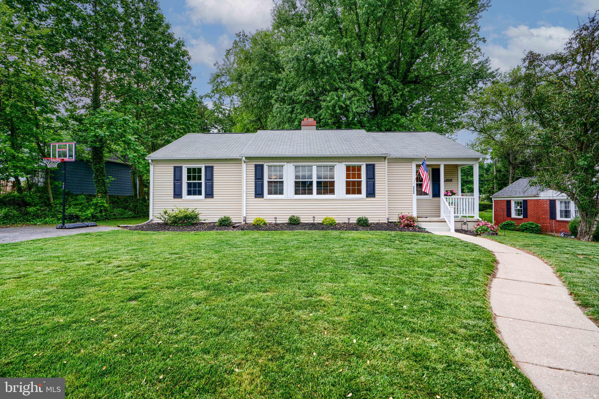8808 Wolverton Road Baltimore, MD 21234 - Photo 6 of 57 a front view of house with yard and green space