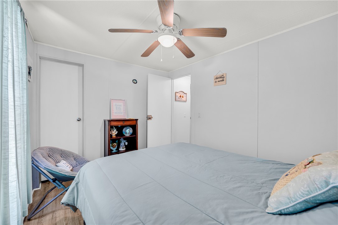 334 Lake Becky Road Mountain Rest, SC 29664 - Photo 21 of 46 A comforting bedroom space featuring a functional ceiling fan for optimal airflow.