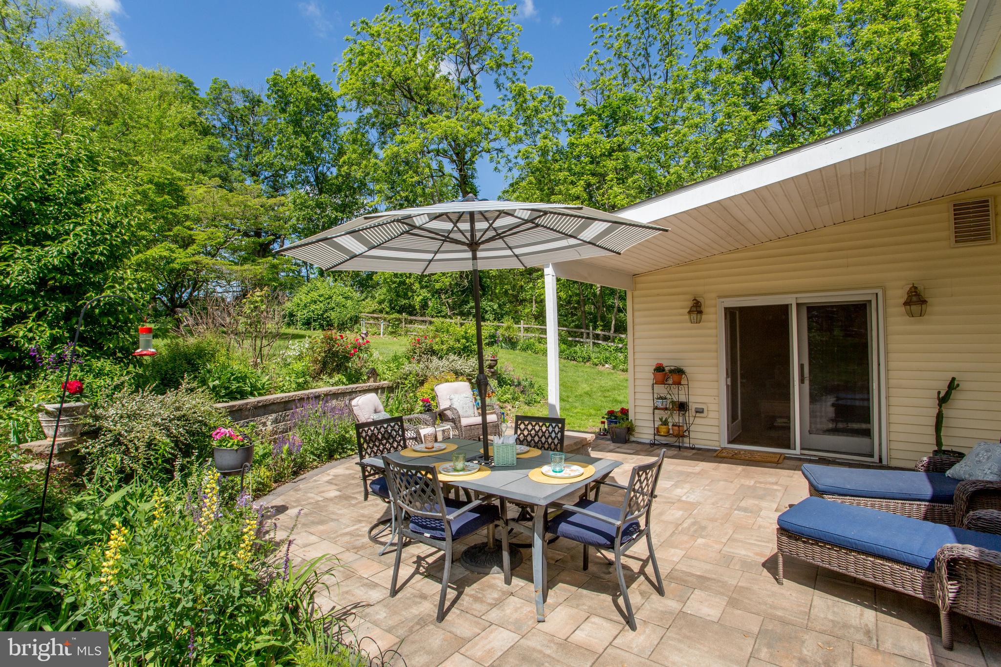 458 Rolling Hills Road Ottsville, PA 18942 - Photo 39 of 60 Patio surrounded by lovely perennial gardens