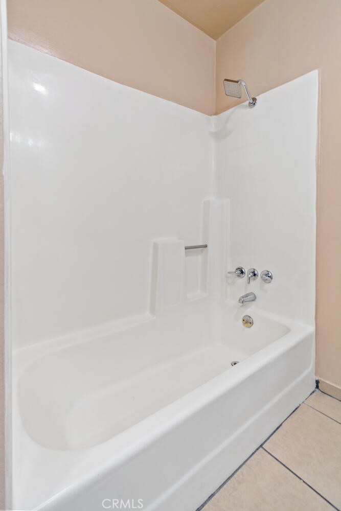 13438 Mercer Street Pacoima, CA 91331 - Photo 28 of 39 a bathroom with a bathtub