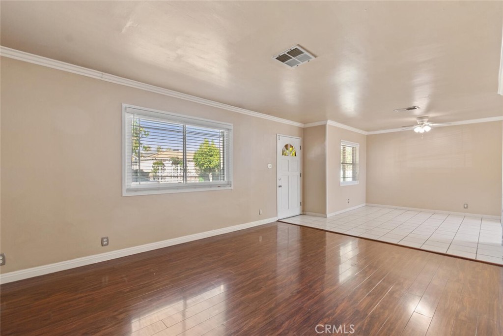 13438 Mercer Street Pacoima, CA 91331 - Photo 6 of 39 wooden floor in an empty room with a window
