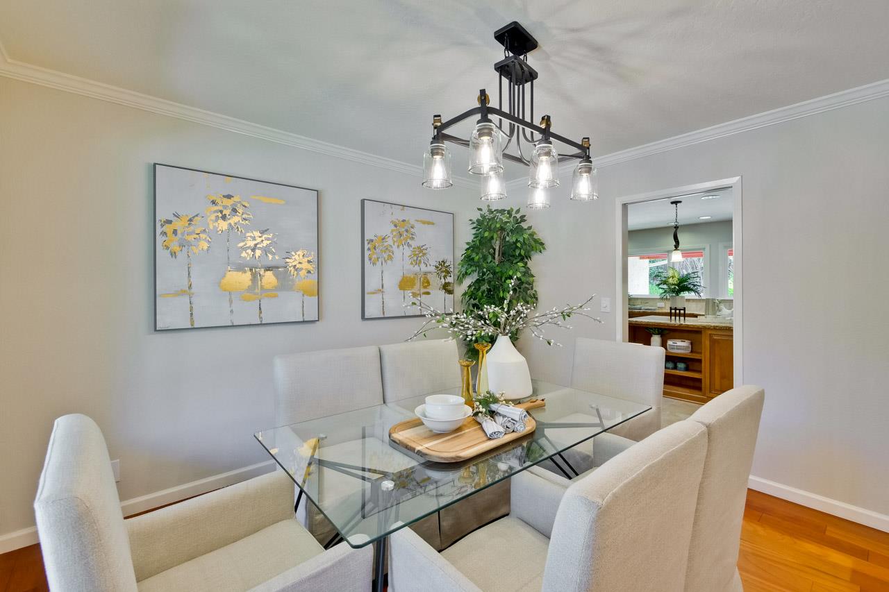 11131 Bubb Road Cupertino, CA 95014 - Photo 13 of 56 a dining room with furniture a chandelier and window