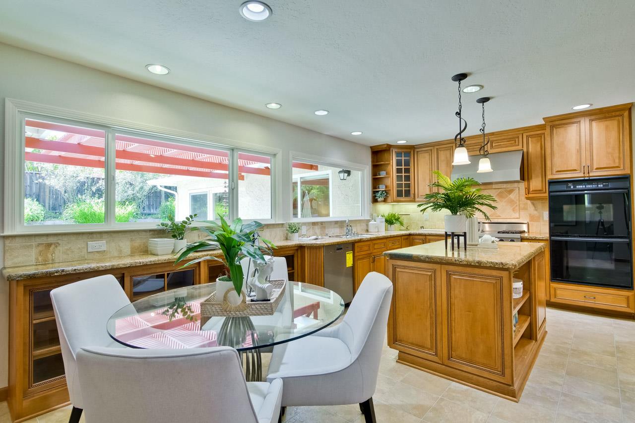 11131 Bubb Road Cupertino, CA 95014 - Photo 18 of 56 a dining room with furniture and window