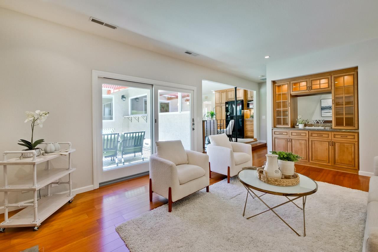 11131 Bubb Road Cupertino, CA 95014 - Photo 23 of 56 a living room with furniture and a table