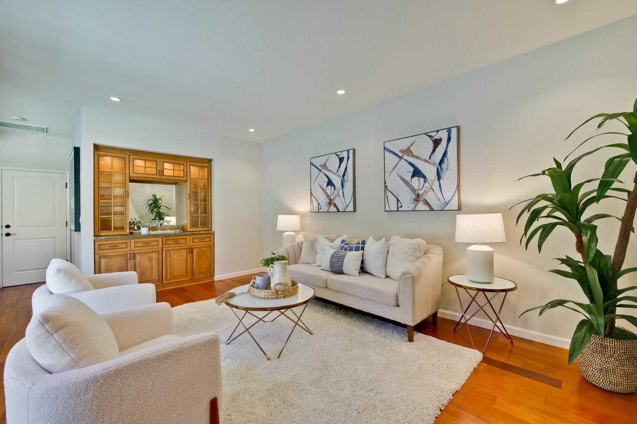 11131 Bubb Road Cupertino, CA 95014 - Photo 25 of 56 a living room with furniture and a large window