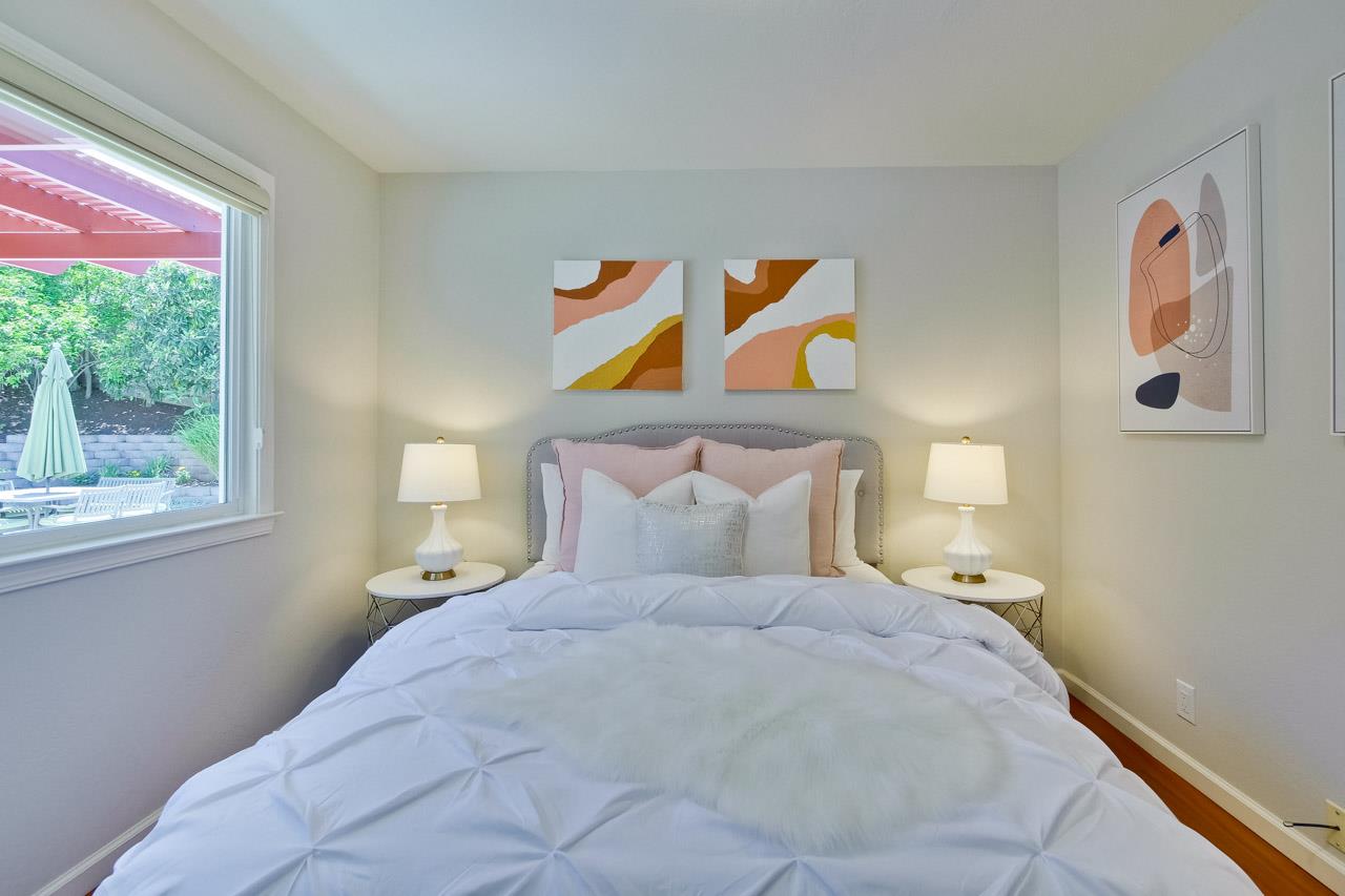 11131 Bubb Road Cupertino, CA 95014 - Photo 36 of 56 a bedroom with a bed and a window