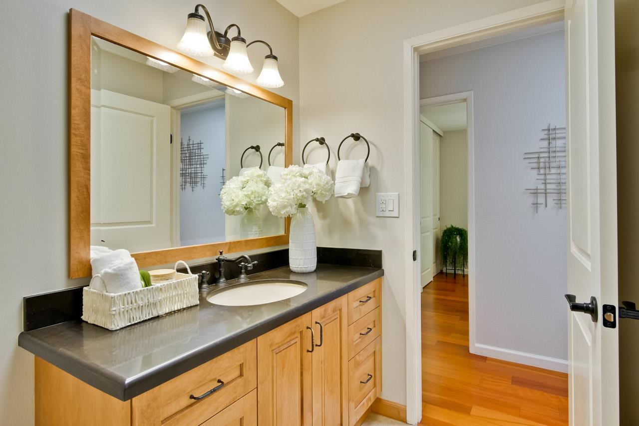 11131 Bubb Road Cupertino, CA 95014 - Photo 39 of 56 a bathroom with a sink and a mirror